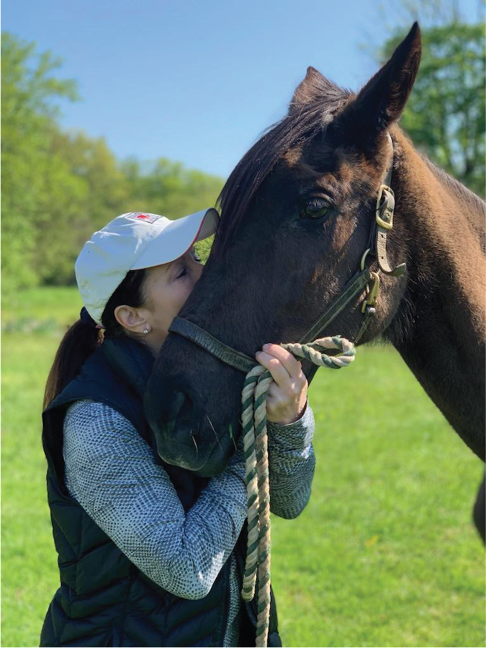 Digital Portrait of a person hugging their horses face.